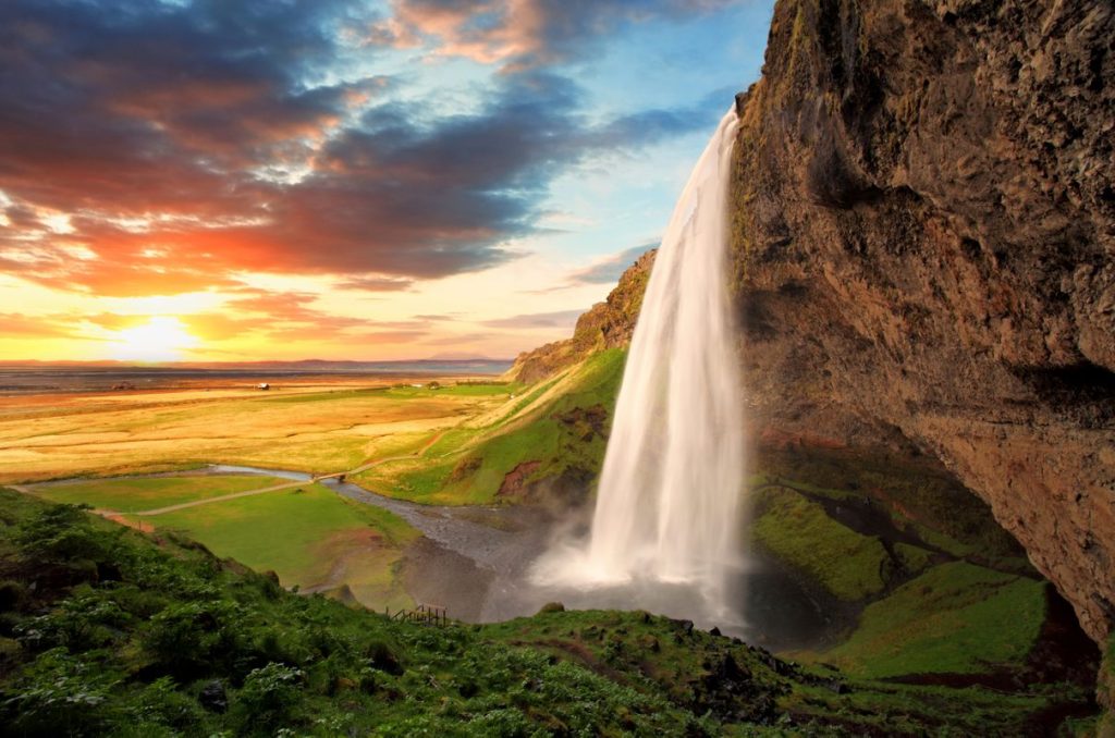 Seljalandsfoss in south iceland with a beautiful sunset